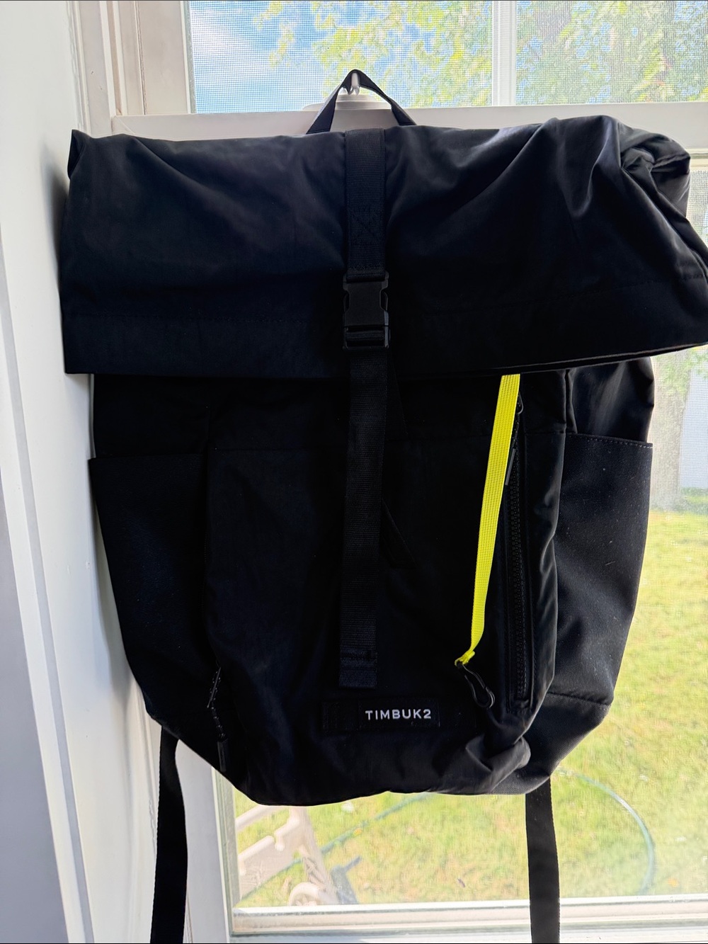 Timbuk2 Black Roll-Top Backpack with Neon Yellow Zipper Pull